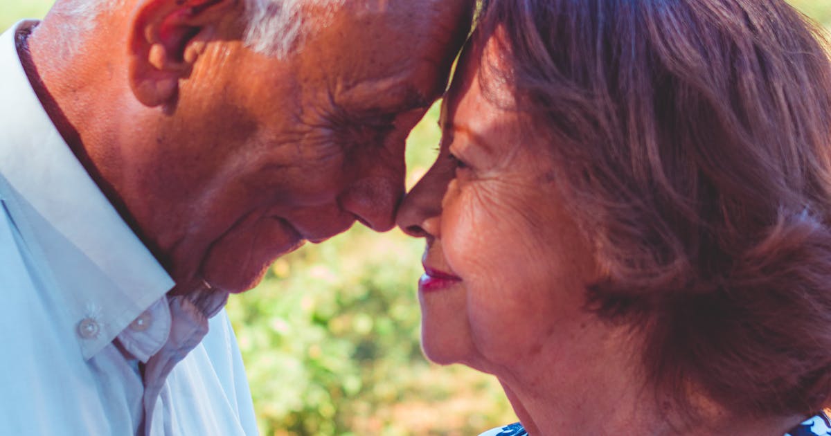 Elderly couple planning senior care costs