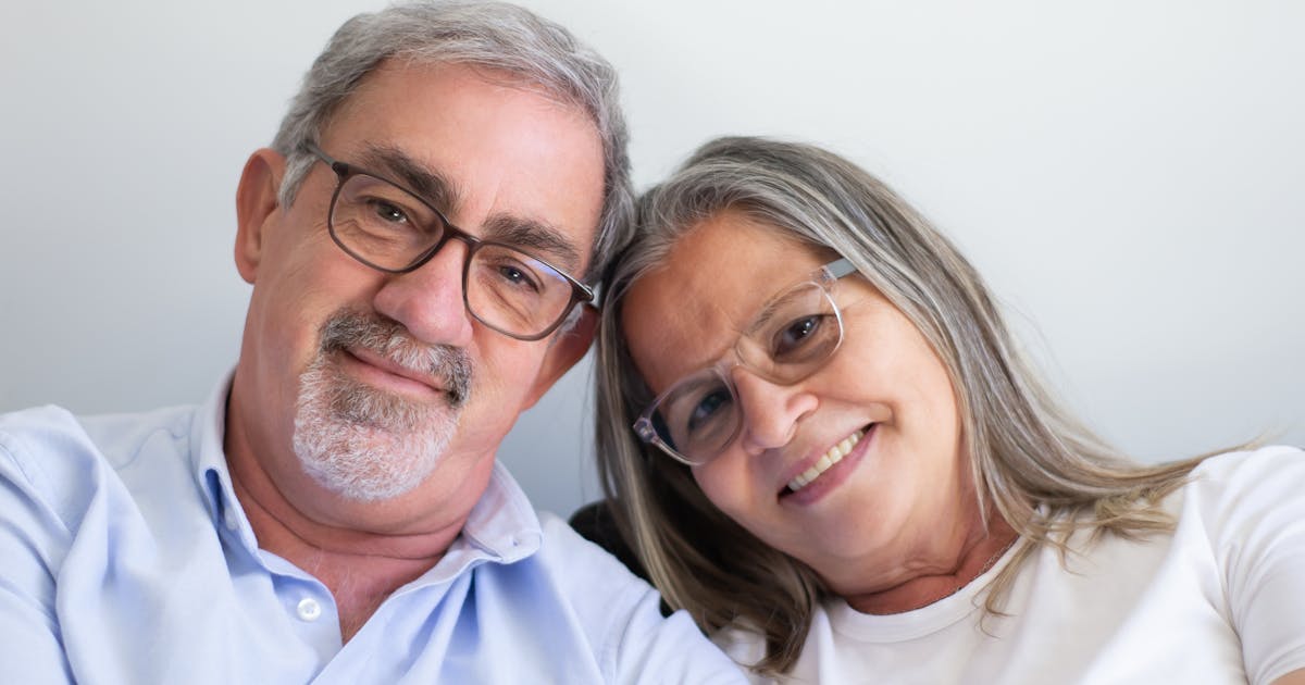 Couple reviewing senior care checklist