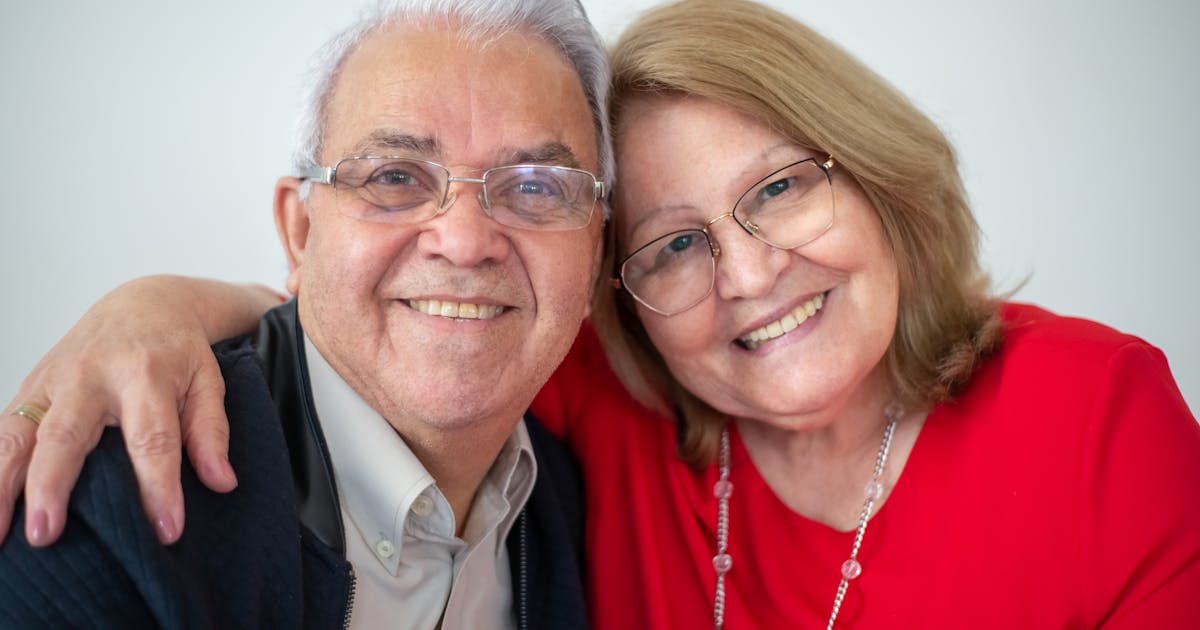 Happy couple choosing senior living